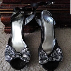 Studded black wedges